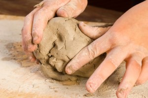 Child hands of a potter